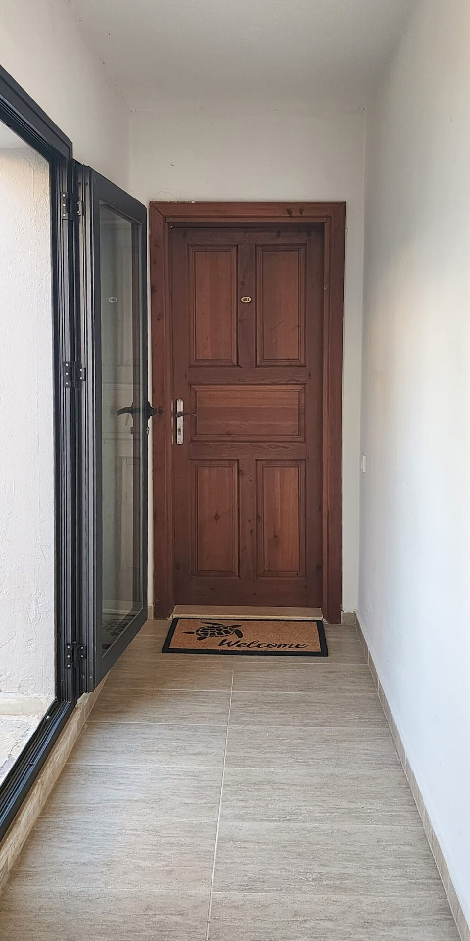 The entrance for "402". You can also access to the backyard from the left door.
