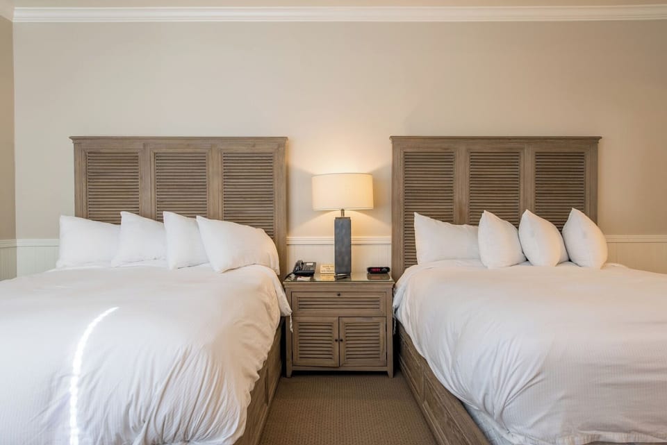 Drift off fast in cloud-soft bedding and quiet comfort.