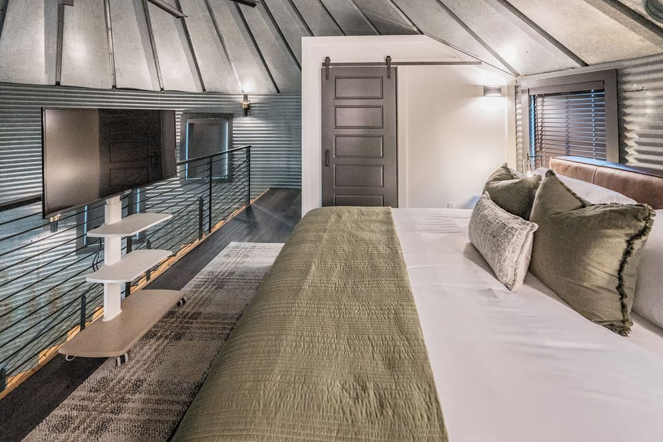 For those who like TV in bed, we keep a roll-out TV in the closet!