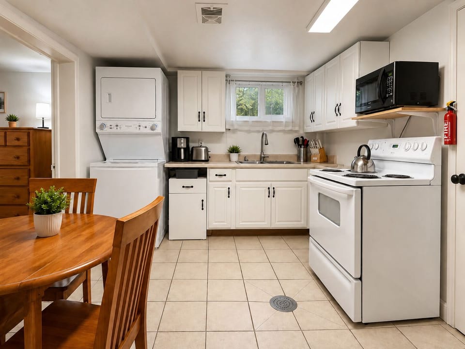 Fully equipped kitchen with in unit washer and dryer