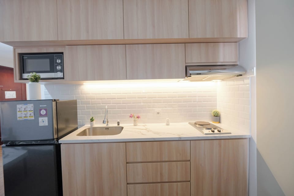 Deluxe Apartment | Private kitchen | Cookware/dishes/utensils