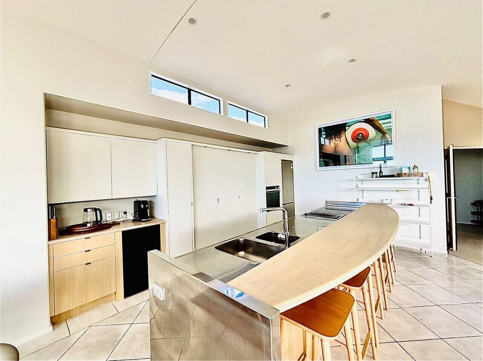 Fully equipped Kitchen with Fridge/Freezer, in-wall convection oven, electric hob & in-bench gas grill, nespresso, wine fridge