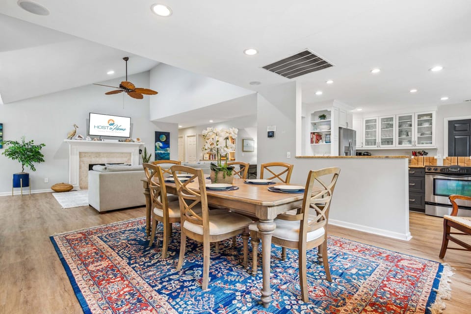 Spacious dining area with seating for 6, plus room for 3 at the kitchen island