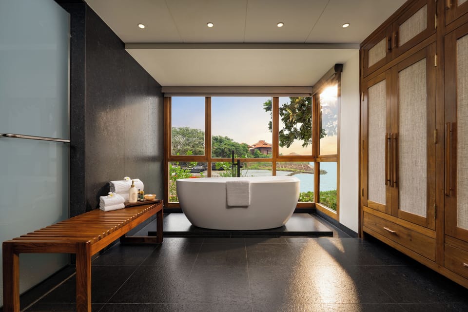 Grand Luxury Balcony Room with Ganges View | Bathroom | Bathrobes, slippers, towels