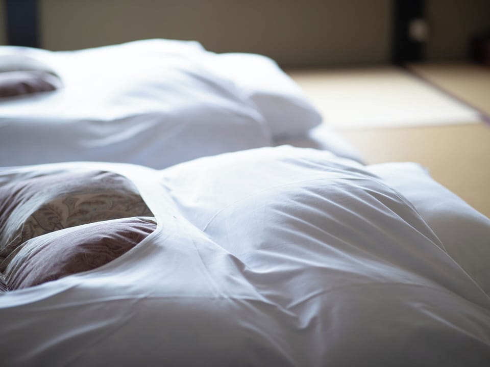 Down comforters, desk, bed sheets