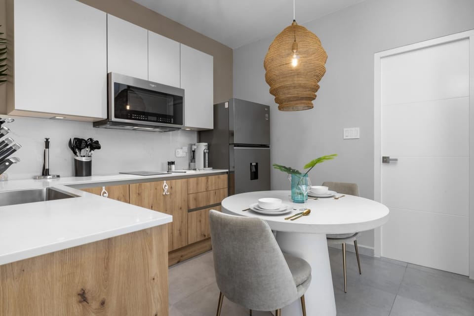 Whip up your favorite meals and enjoy them together. Our listing includes a fully-equipped kitchen with all the essentials and a charming 2-person dining nook, ideal for a romantic dinner or a quiet breakfast before exploring the island.