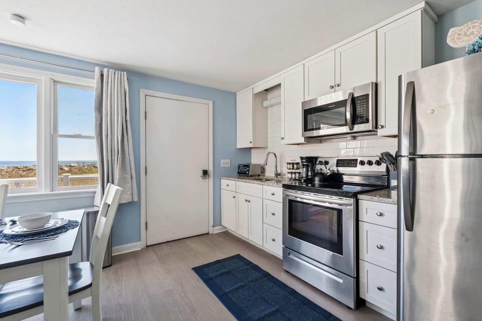 Fully equipped open kitchen, dining, and living room!