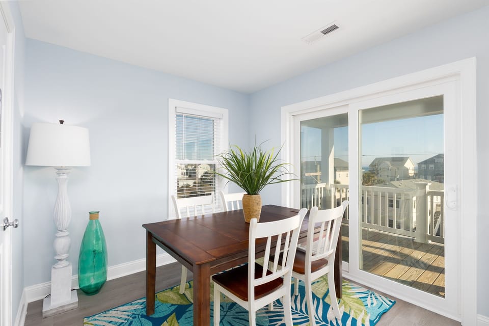 An additional dining space with peek-a-boo views of the ocean 