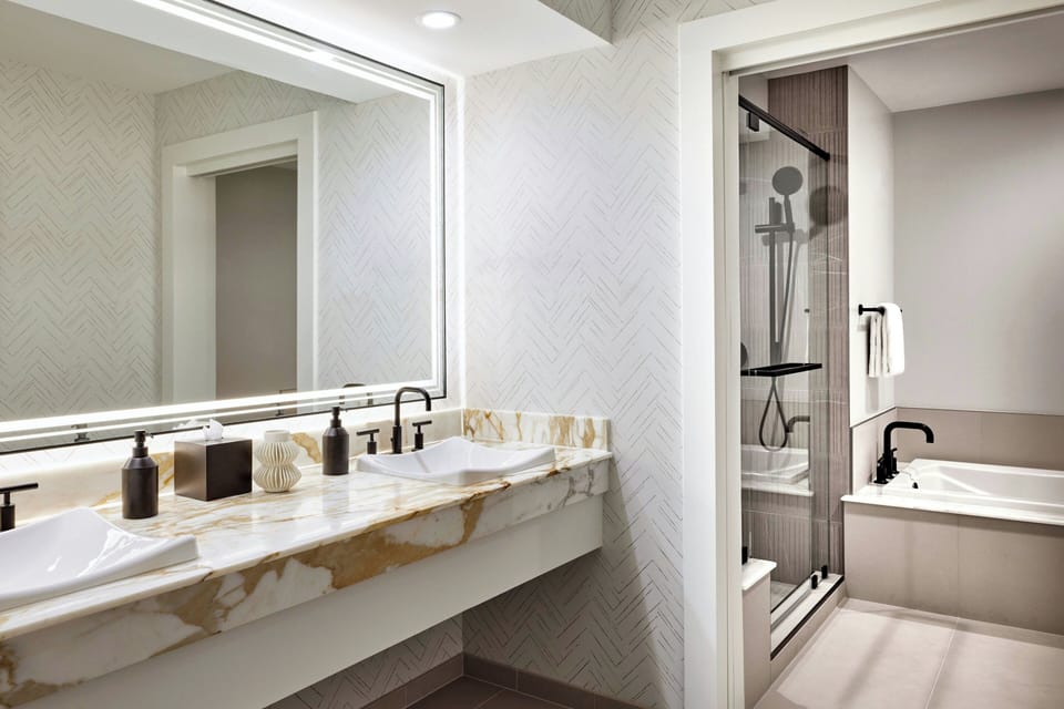 Designer toiletries, hair dryer, towels, soap