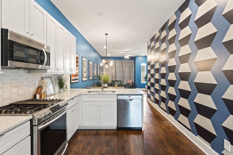 Fully equipped kitchen with high-end appliances.