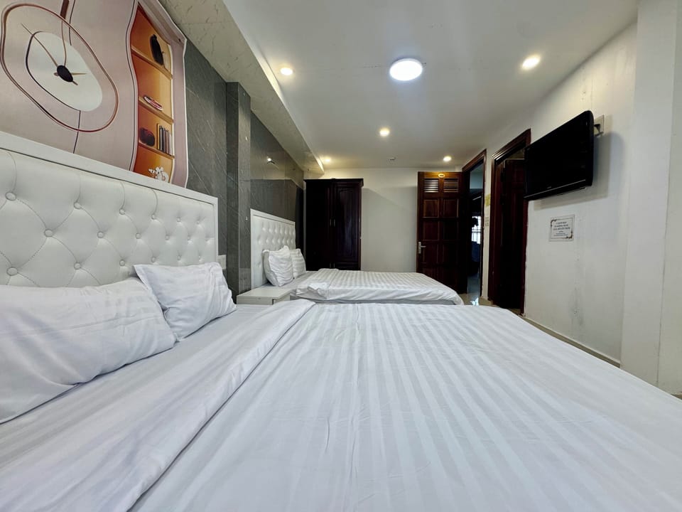 Deluxe Quadruple Room | Desk, free WiFi