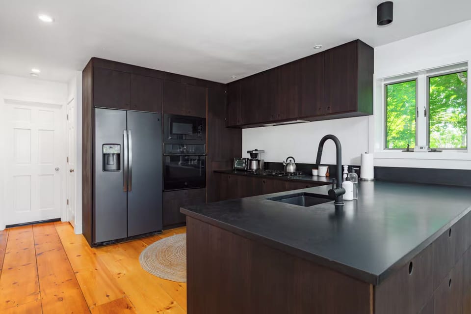 Head upstairs to the main floor and find yourself in the kitchen