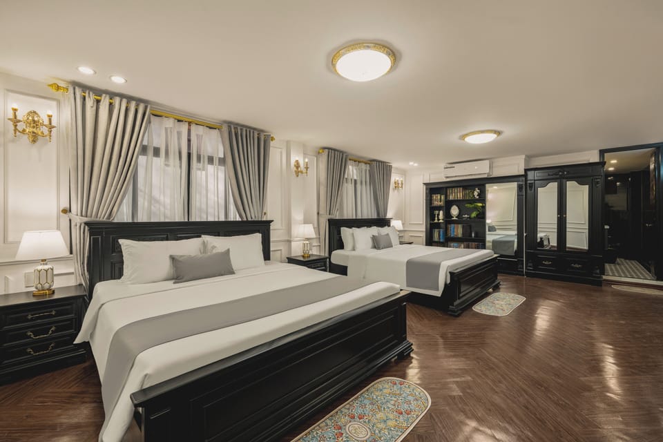 Deluxe Quadruple Room, City View | Desk, laptop workspace, soundproofing, WiFi (free)