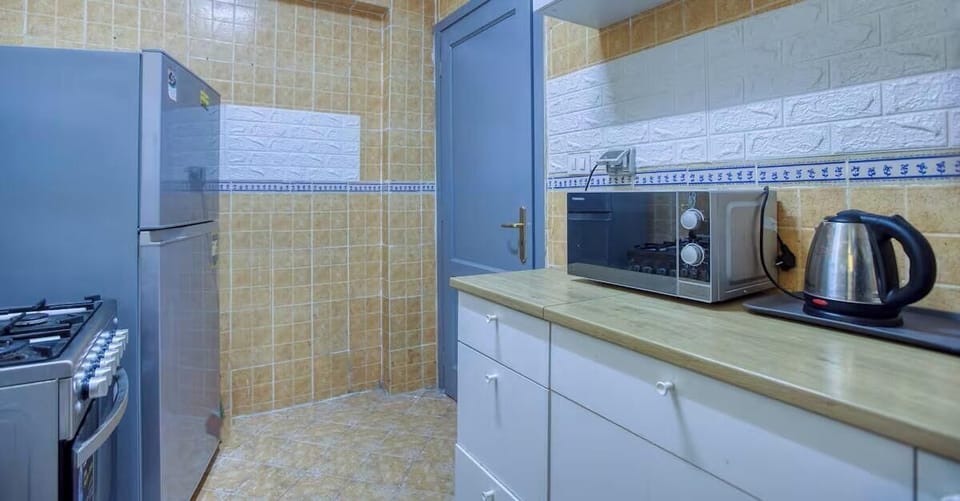 Comfort Apartment, City View | Private kitchen | Espresso maker, coffee/tea maker, electric kettle