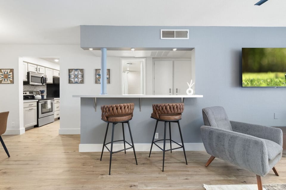 Enjoy meals or coffee at the kitchen island with two seats.