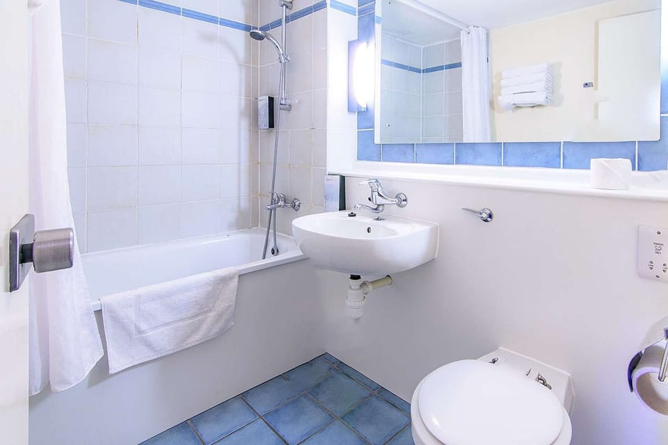Hair dryer, towels, toilet paper