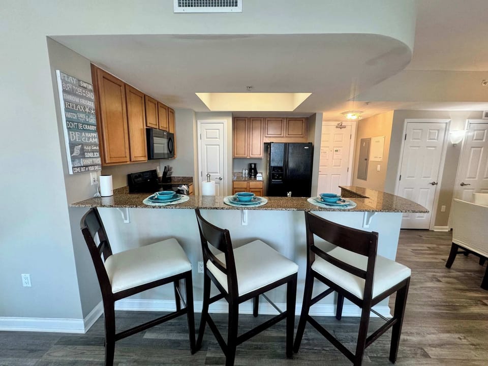 Convenient Bar seating in fully equipped kitchen 