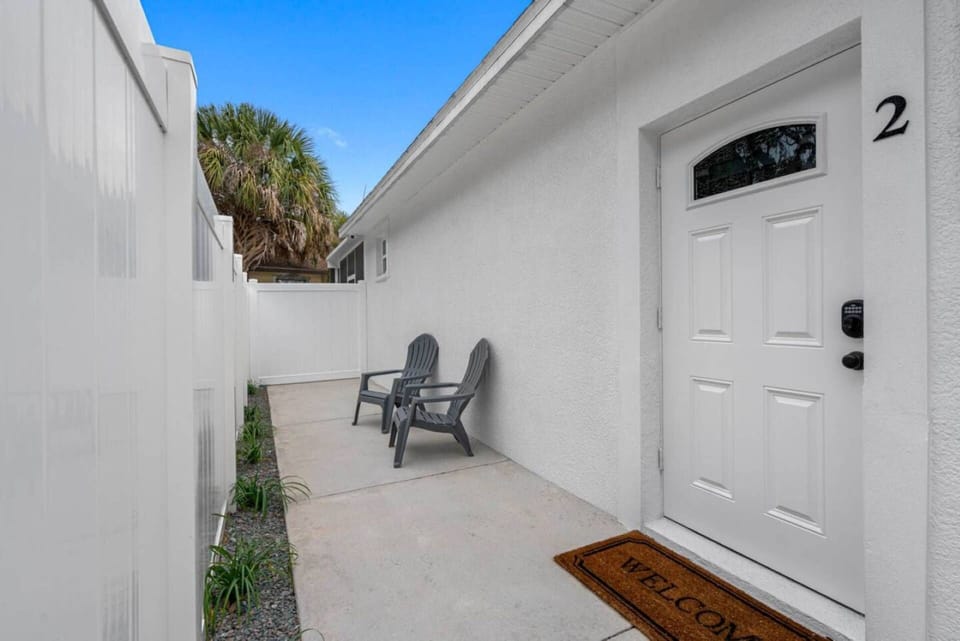 Completely private fenced entrance with a personal door code