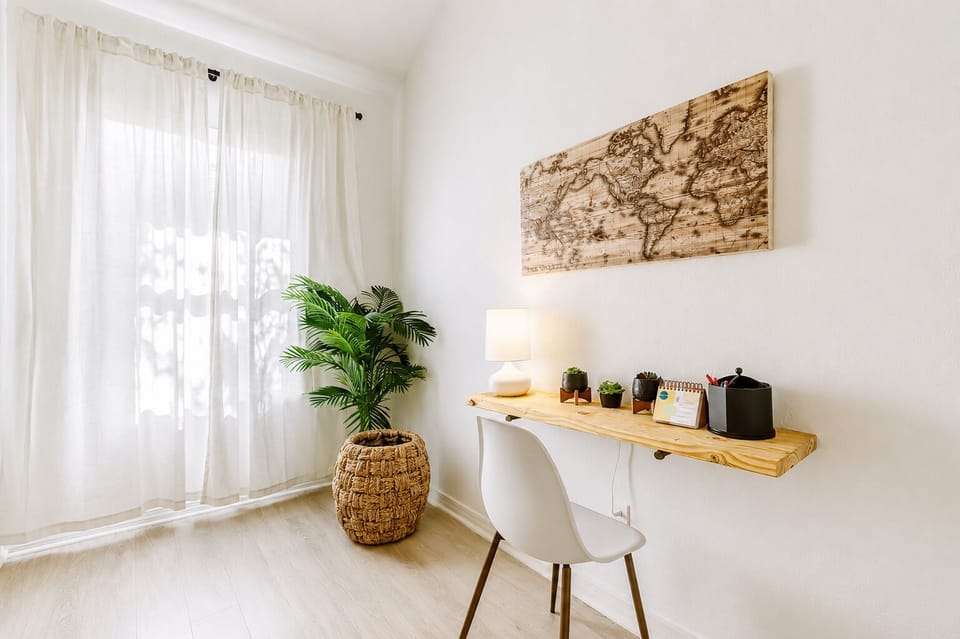 Bright minimalist workspace with natural light and stylish décor