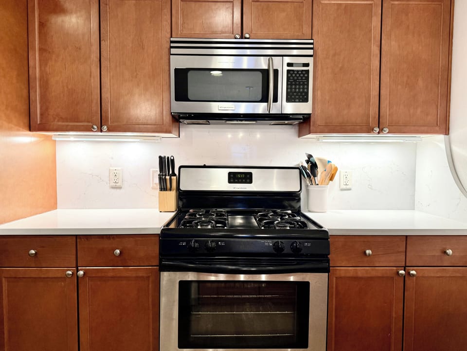 Your fully equipped kitchen makes meal prep a breeze with a gas range, microwave, and ample counter space for cooking your favorite dishes.