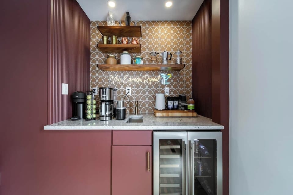 A curated coffee bar with Nespresso, frother, and a variety of options to start your mornings just right.