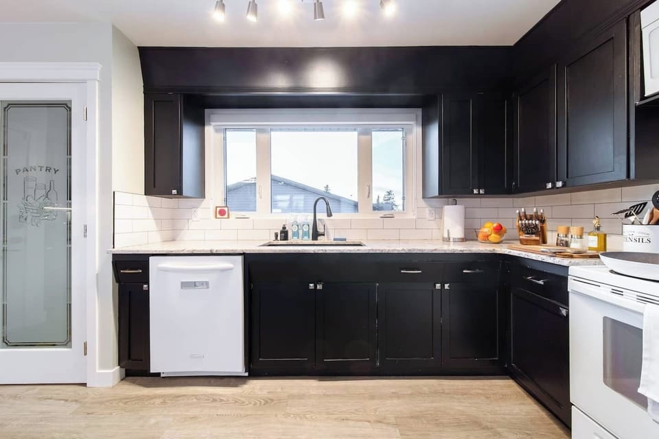 Sleek and modern with a fully stocked pantry. Cook your favorite meals effortlessly with essential appliances and plenty of space to create.