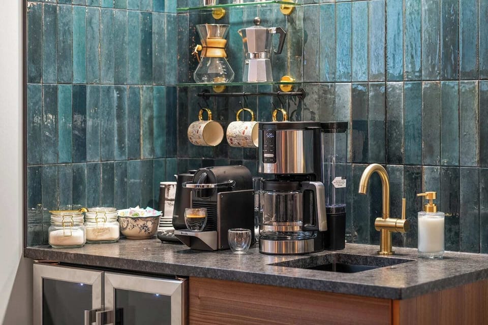 Brew your perfect cup in this beautifully curated coffee station featuring multiple brew options, elegant finishes, and everything you need to start your day right.