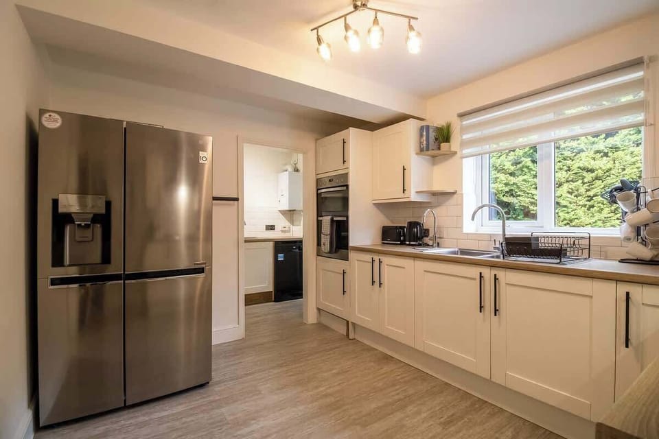 “Spacious kitchen with complete appliances — perfect for cooking, meal prep, or trying out new recipes.”