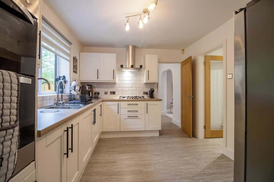“Spacious kitchen with complete appliances — perfect for cooking, meal prep, or trying out new recipes.”