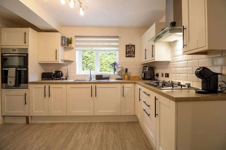 “Spacious kitchen with complete appliances — perfect for cooking, meal prep, or trying out new recipes.”