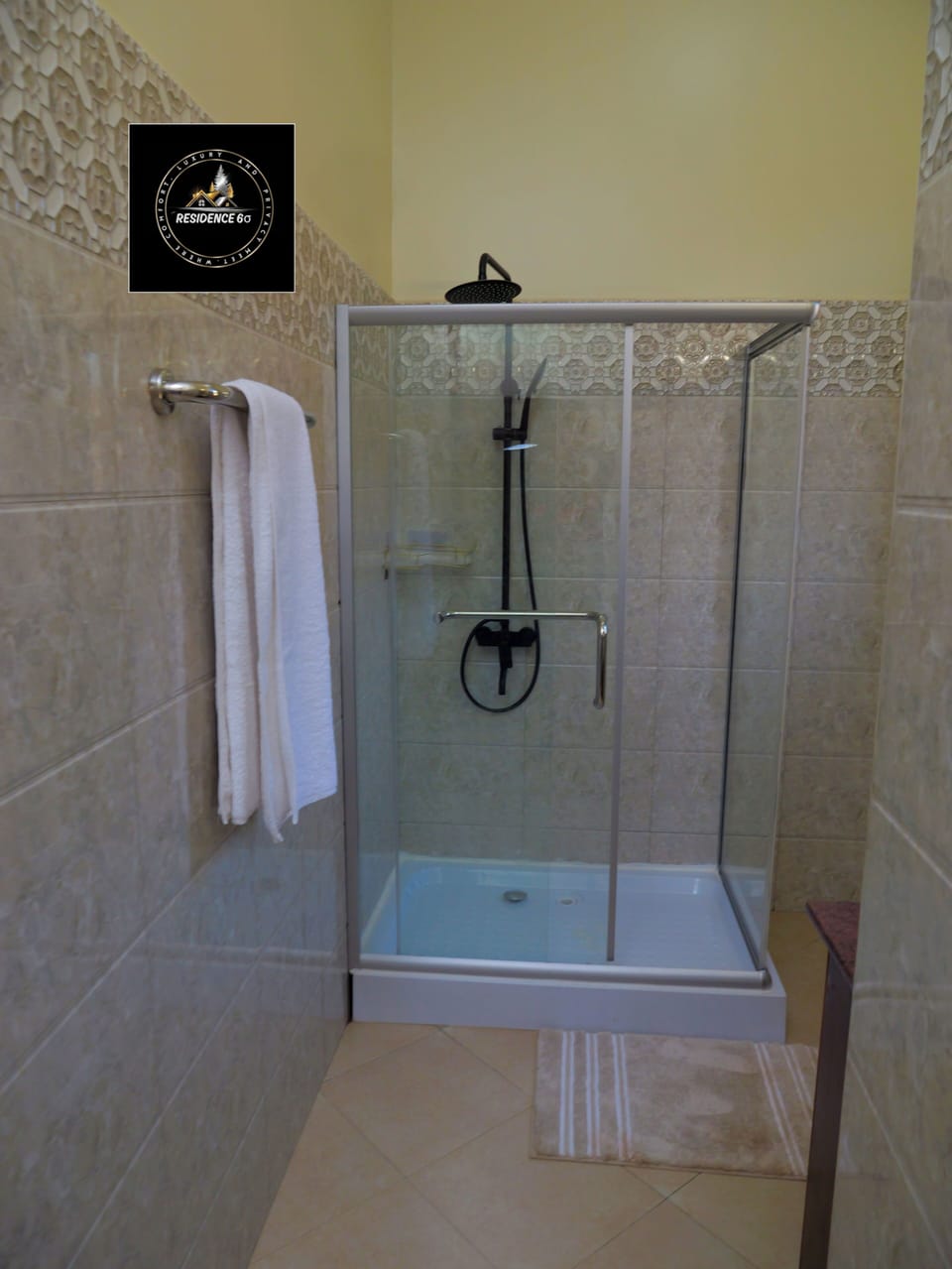 Shower, free toiletries, slippers, soap
