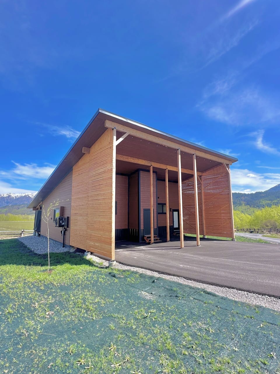 Enclosed carport keeping heat out with snow/rain protection.