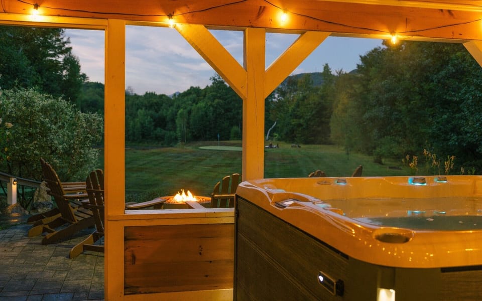 Covered hot tub area with view