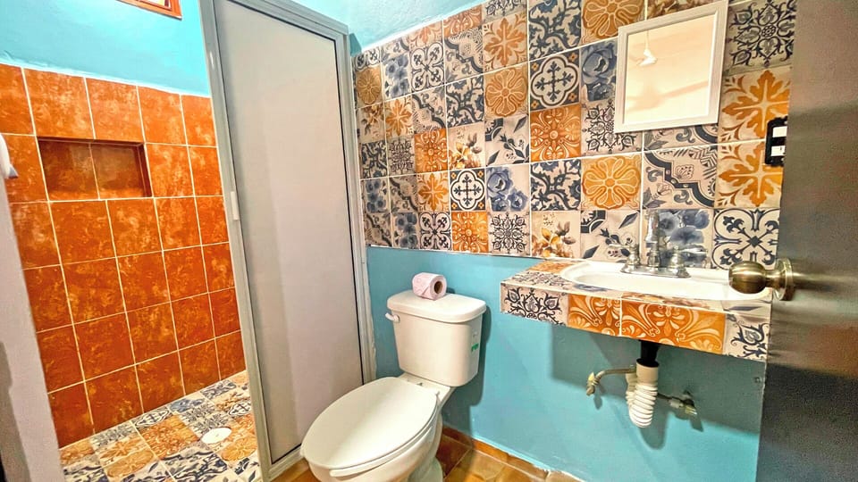 Basic Triple Room | Bathroom | Shower, towels, soap, shampoo