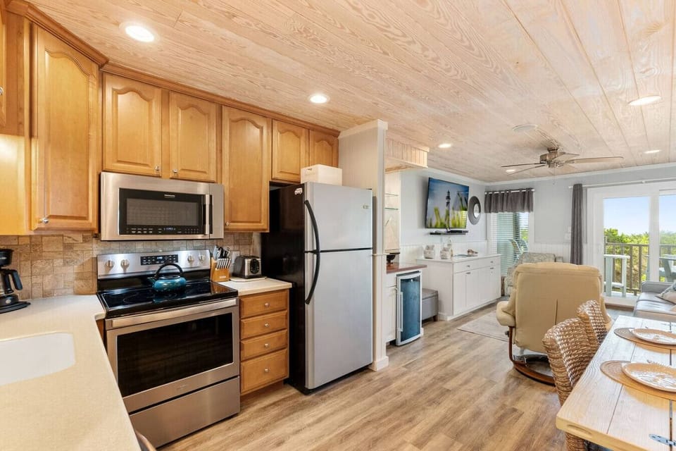 Open layout brings everyone together—from meal prep to movie night.
