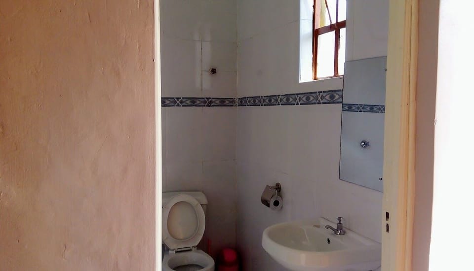 Shower, free toiletries, slippers, towels