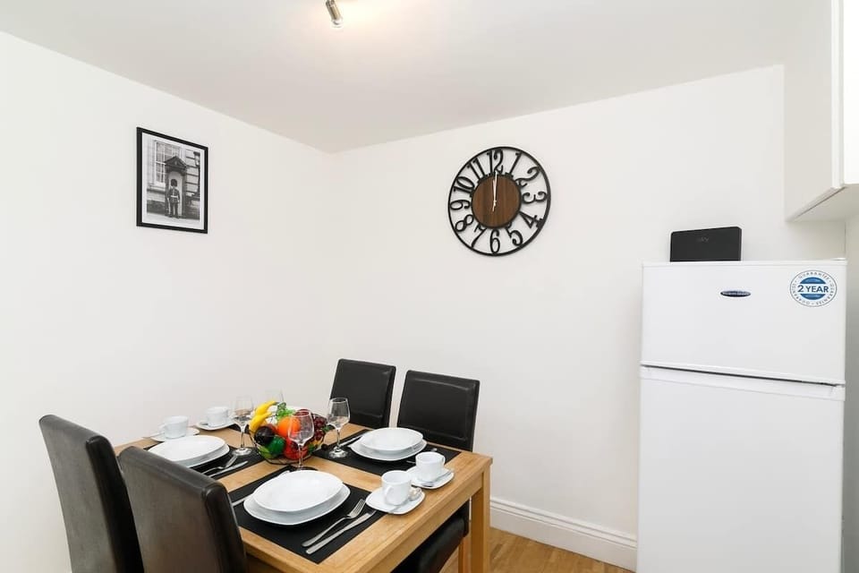 Dining area overlooking the open-plan living and kitchen space