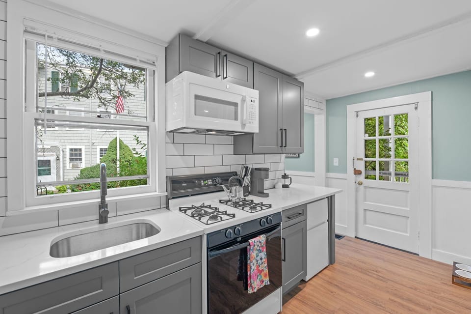 Modern kitchen with sleek cabinetry, ample counter space!