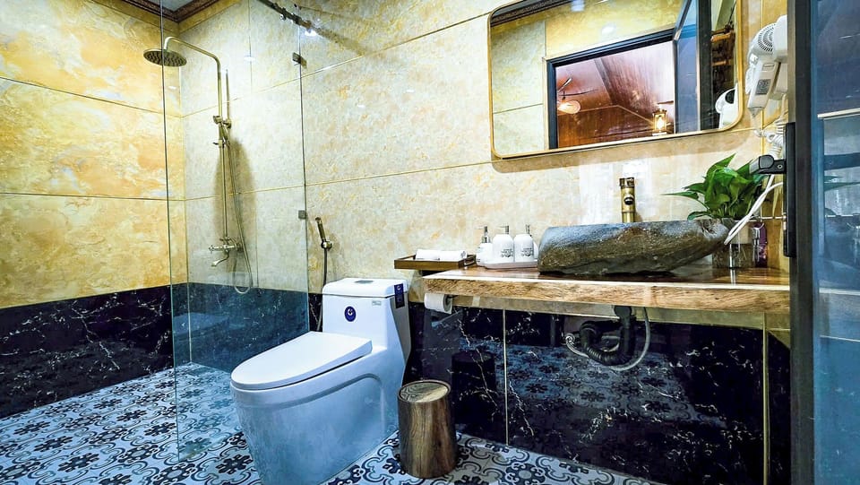 Shower, free toiletries, hair dryer, slippers