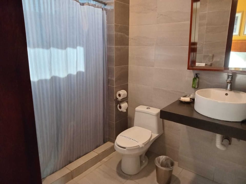 Double Room, 2 Queen Beds, Non Smoking | Bathroom | Shower, hair dryer, towels, soap