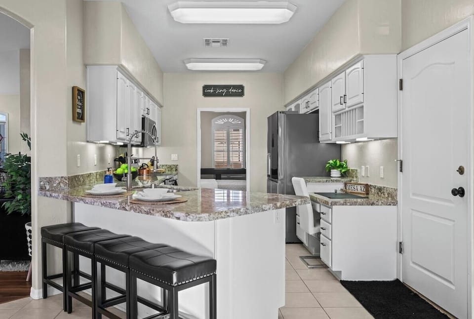 Pull up a seat at the breakfast counter or gather at the dining table for family meals and late-night laughs.