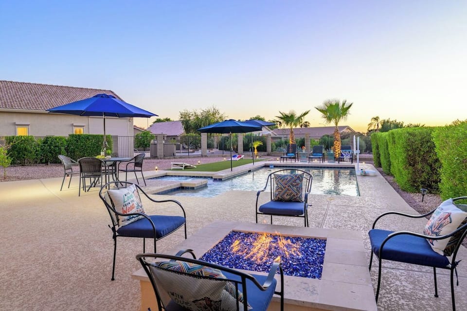 Unwind by the glow of the firepit as the sun dips behind the golf course — it's easy to see how this home got its name.