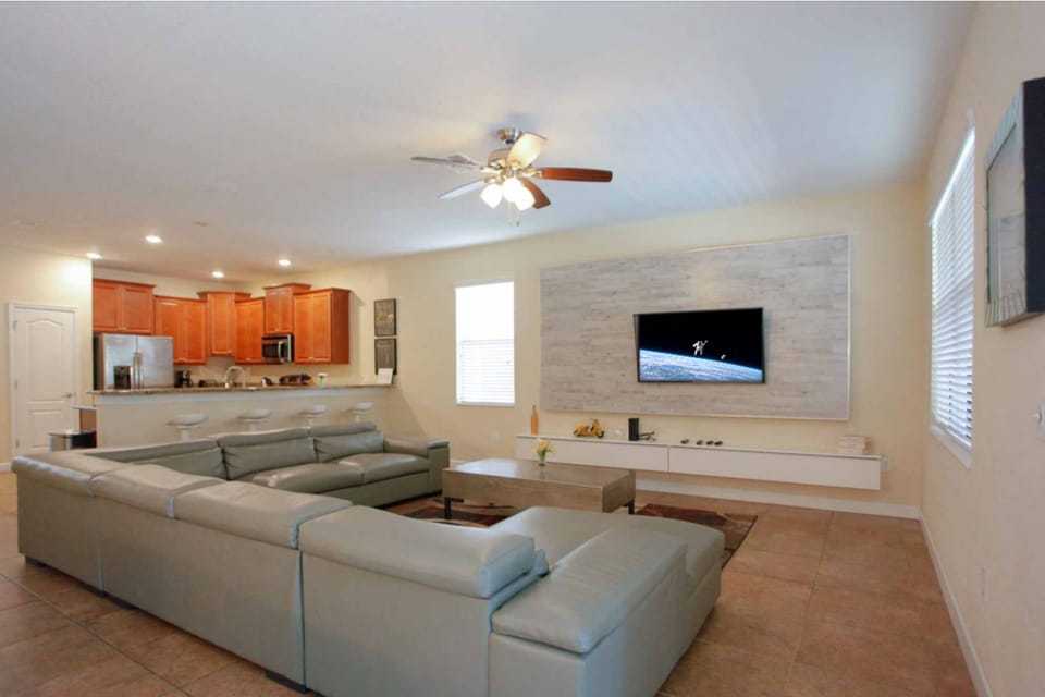 Enjoy the open-concept design, where the kitchen, dining, and living areas flow together, perfect for entertaining and spending time with family and friends.