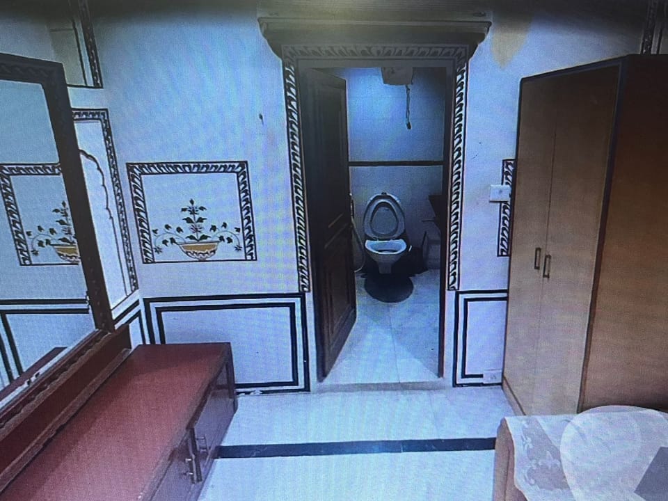 Shower, free toiletries, slippers, towels