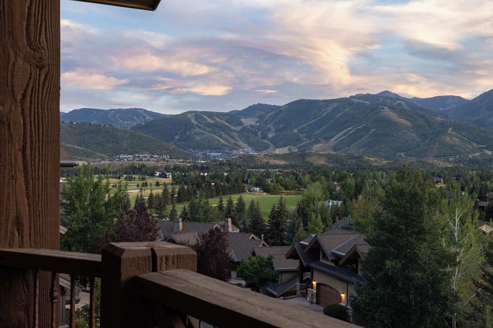 Soak in breathtaking mountain views from your private deck