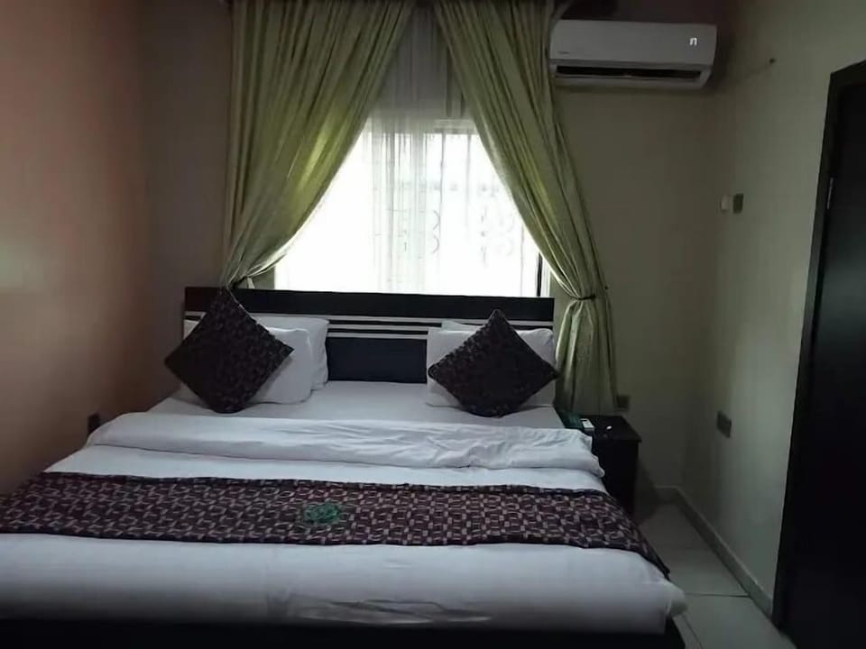 Family Apartment, Balcony, City View | Desk, laptop workspace, blackout drapes, soundproofing