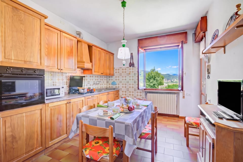Family Apartment, 2 Bedrooms, Balcony (A Due Passi Dal Bosco: Hillside) | Private kitchen