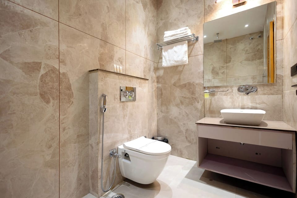 Shower, free toiletries, slippers, towels