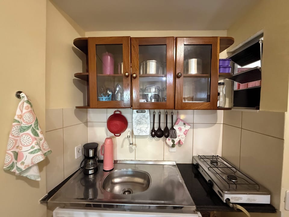 Family Studio, Multiple Beds | Private kitchen | Full-size fridge, microwave, coffee/tea maker, cookware/dishes/utensils