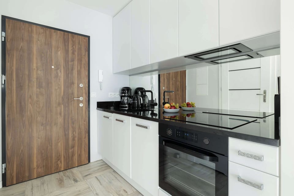 The fully equipped kitchenette includes everything you need for a home-cooked meal.